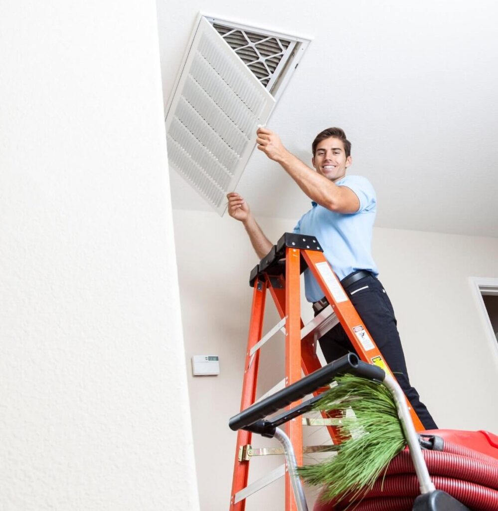 bonney hvac tech changing a home air filter