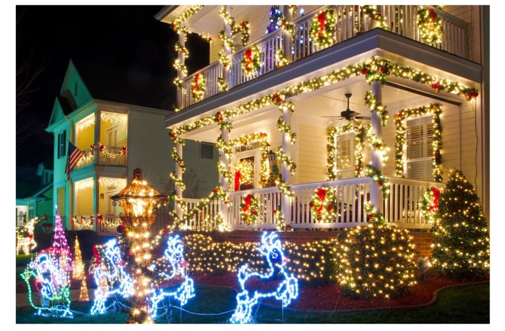 two-story home decorated with lots of christmas lights